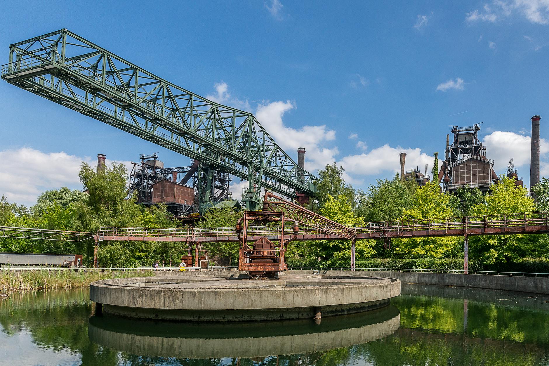 old sedimentation tank and bridge structures at mine