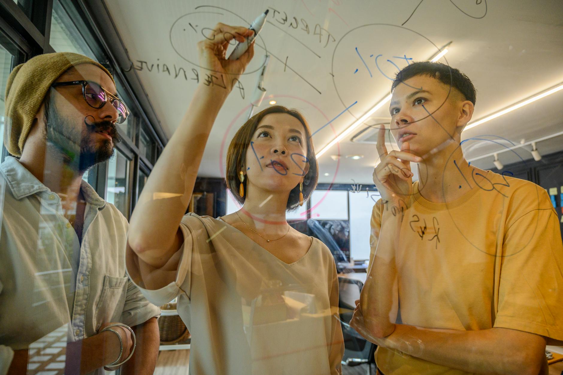 people writing on glass