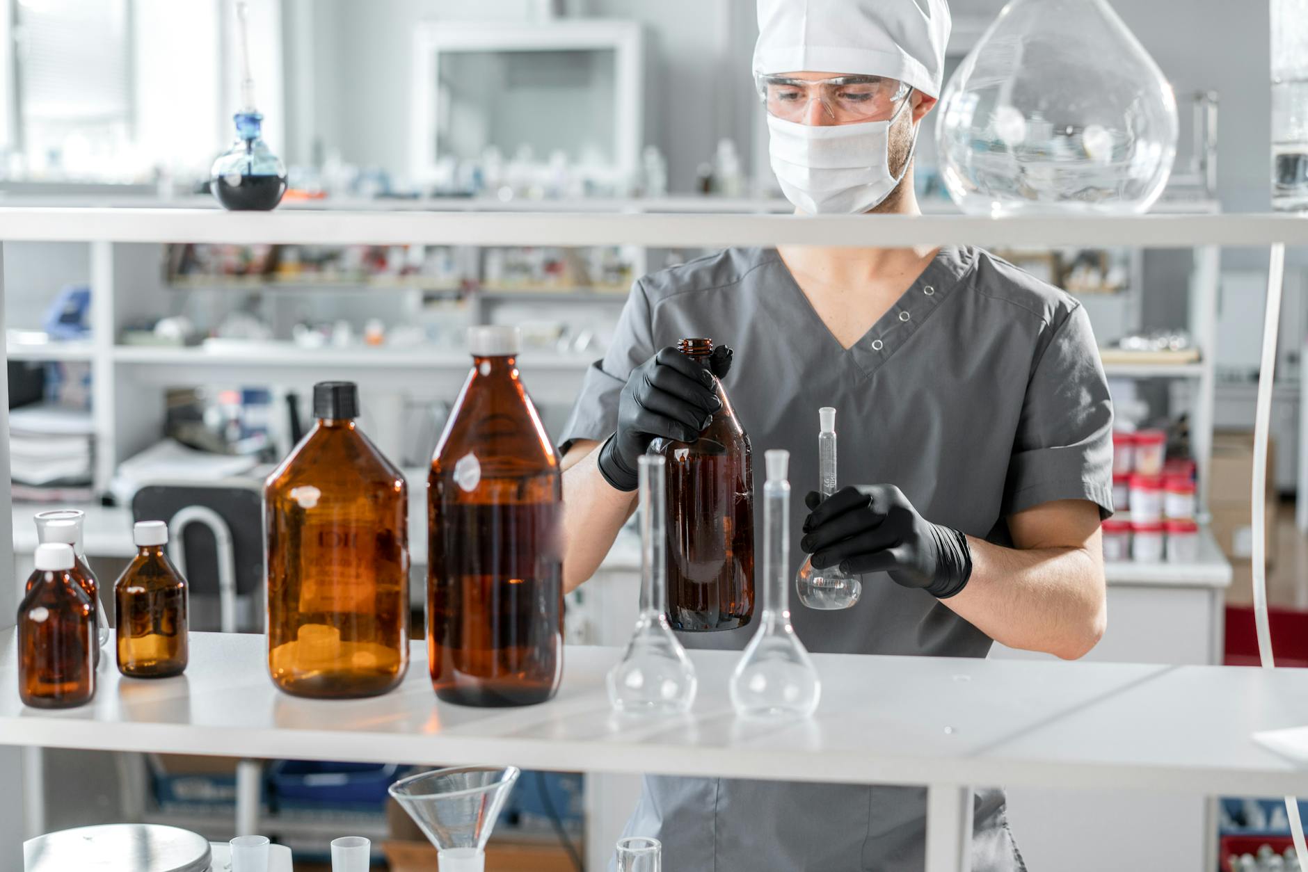 man person bottles holding
